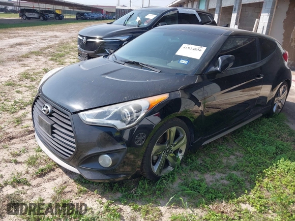 2013 Hyundai Veloster Turbo z VIN KMHTC6AE7DU124293, wystawiony jako IAAI lot #41924836 z przebiegiem 141 685 mil mil oraz . Historia ofert i sprzedaży dostępna na DreamBid. Obrazek 2.
