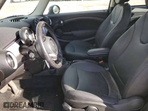 2012 MINI Hardtop with VIN WMWSU3C54CT255997, listed as a Copart auction lot 49162435 with 87,708 mi miles and Salvage Title. Bid and sale history available at DreamBid. Image 7.