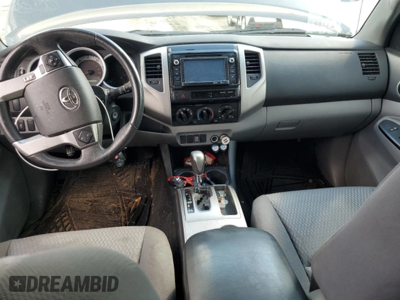 2014 Toyota Tacoma PreRunner z VIN 5TFJU4GN2EX054013, wystawiony jako Copart lot #56953795 z przebiegiem 183 484 mil mil oraz Szkoda całkowita • Salvage title. Historia ofert i sprzedaży dostępna na DreamBid. Obrazek 8.