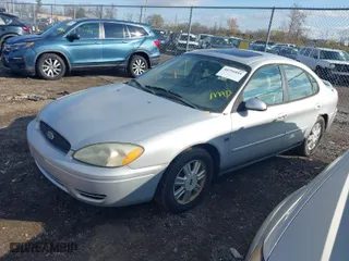 2004 Ford Taurus SEL with VIN 1FAFP56S04A205058, listed as a IAAI auction lot 40796889 with 187,562 mi miles. Bid and sale history available at carsss.com. Image 2.