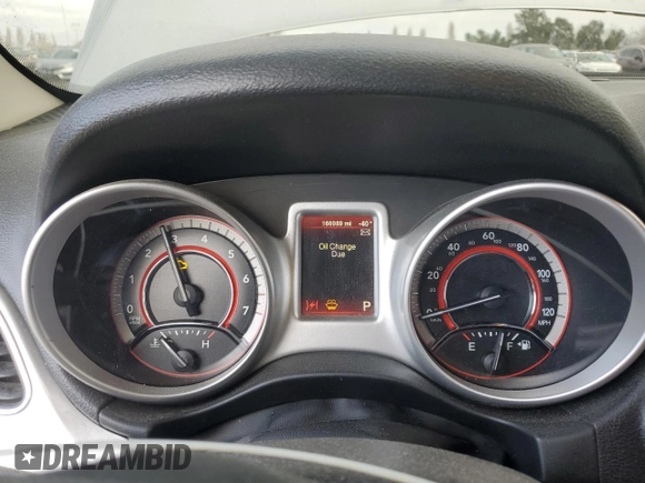 2014 Dodge Journey SXT with VIN 3C4PDCBG5ET227189, listed as a Copart auction lot 88994355 with 166,989 mi miles and Salvage Title. Bid and sale history available at carsss.com. Image 9.