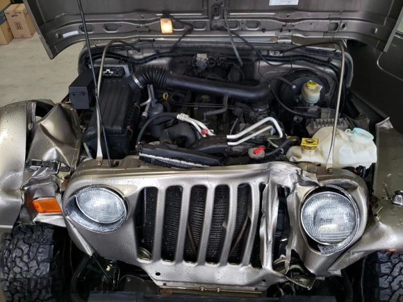2004 Jeep Wrangler Sahara with VIN 1J4FA59S14P770952, listed as a Copart auction lot 66498694 with 112,649 mi miles and Salvage Title. Bid and sale history available at carsss.com. Image 12.