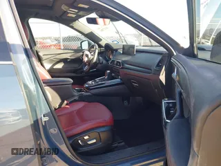 2022 Mazda CX-9 Grand Touring with VIN JM3TCBDYXN0625567, listed as a IAAI auction lot 41327380 with 50,672 mi miles and . Bid and sale history available at DreamBid. Image 5.