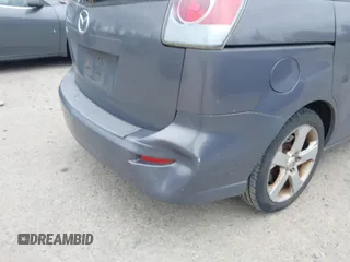 2007 Mazda 5 Touring with VIN JM1CR293570137215, listed as a IAAI auction lot 42497432 with 135,025 mi miles and . Bid and sale history available at DreamBid. Image 13.
