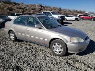 2000 Honda Civic EX with VIN 2HGEJ8643YH519550, listed as a Copart auction lot 42168705 with 155,786 mi miles and Clean Title. Bid and sale history available at carsss.com. Image 4.