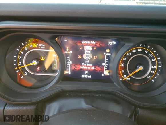 2024 Jeep Wrangler Sahara with VIN 1C4PJXENXRW118401, listed as a Copart auction lot 84731534 with 6,895 mi miles and Salvage Title. Bid and sale history available at DreamBid. Image 9.