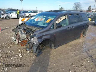 2012 Toyota Sienna SE with VIN 5TDXK3DC5CS264461, listed as a IAAI auction lot 41526874 with 1 mi miles. Bid and sale history available at carsss.com. Image 22.