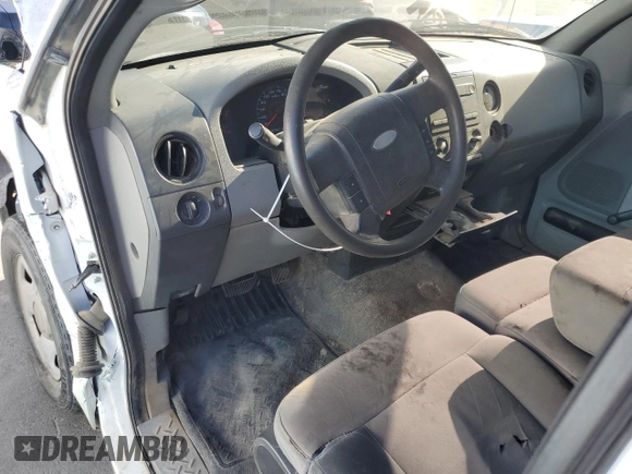 2007 Ford F-150 XL z VIN 1FTRF12257KB83095, wystawiony jako Copart lot #60567795 z przebiegiem 133 543 mil mil oraz Szkoda całkowita • Salvage title. Historia ofert i sprzedaży dostępna na DreamBid. Obrazek 8.