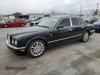 2005 Bentley Arnage R with VIN SCBLC37F95CX10586, listed as a Copart auction lot 55852485 with 38,584 mi miles and Salvage Title. Bid and sale history available at DreamBid. Image 1.