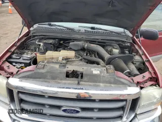 2003 Ford F-250 XL z VIN 1FTNW21L13EB65006, wystawiony jako Copart lot #46808255 z przebiegiem 290 841 mil mil oraz Czysty tytuł • Clean title. Historia ofert i sprzedaży dostępna na DreamBid. Obrazek 11.