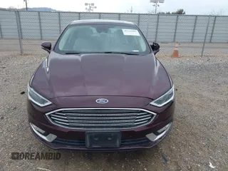 2017 Ford Fusion Titanium with VIN 3FA6P0SU3HR208641, listed as a IAAI auction lot 41732983 with 80,428 mi miles and . Bid and sale history available at DreamBid. Image 12.