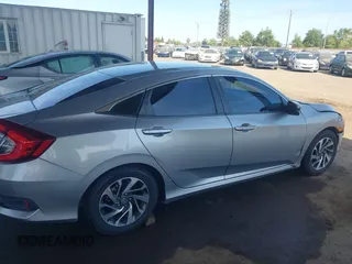 2016 Honda Civic EX with VIN 19XFC2F73GE239657, listed as a IAAI auction lot 42085960 with 136,207 mi miles and . Bid and sale history available at DreamBid. Image 13.