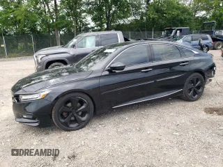 2018 Honda Accord Touring с VIN 1HGCV2F91JA012963, выставлен на аукционе Copart как лот 61907965 с пробегом 85 972 миль миль и Списание • Salvage title. История ставок и продаж доступна на DreamBid. Изображение 1.