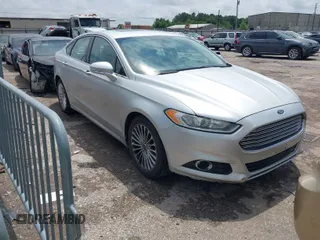 2014 Ford Fusion Titanium with VIN 3FA6P0K99ER181842, listed as a IAAI auction lot 42093066 with 115,798 mi miles. Bid and sale history available at carsss.com. Image 1.