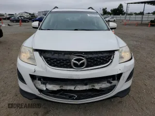 2012 Mazda CX-9 Touring with VIN JM3TB3CV3C0336043, listed as a Copart auction lot 59914335 with 106,595 mi miles and Salvage title. Bid and sale history available at DreamBid. Image 5.