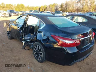 2018 Nissan Altima 2.5 S with VIN 1N4AL3AP7JC196940, listed as a IAAI auction lot 41767112 with 124,736 mi miles. Bid and sale history available at carsss.com. Image 3.