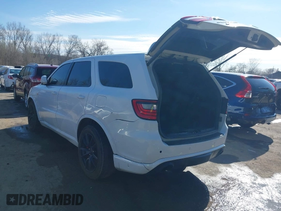 2018 Dodge Durango SRT with VIN 1C4SDJGJXJC395094, listed as a IAAI auction lot 41857351 with 90,106 mi miles and . Bid and sale history available at DreamBid. Image 3.