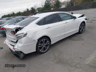 2020 Ford Fusion Titanium with VIN 3FA6P0K92LR103416, listed as a IAAI auction lot 41681810 with 54,902 mi miles and . Bid and sale history available at DreamBid. Image 4.