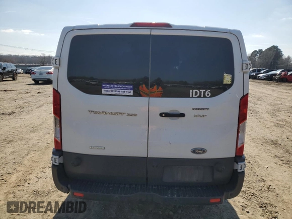 2018 Ford Transit Passenger XL with VIN 1FBZX2YG4JKA75505, listed as a Copart auction lot 45177795 with 183,203 mi miles and Salvage title. Bid and sale history available at DreamBid. Image 6.