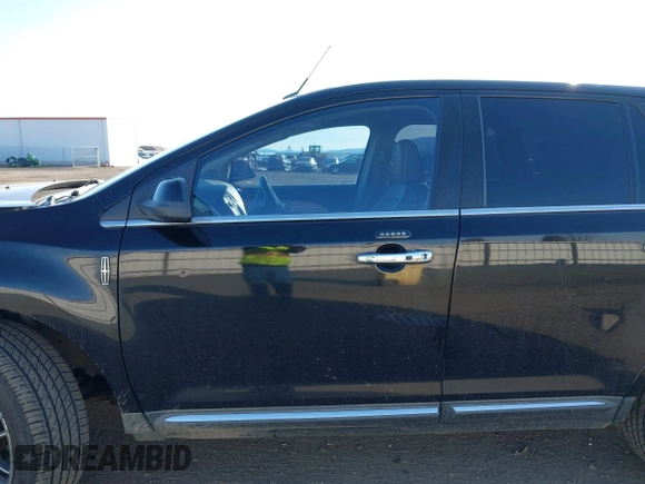 2011 Lincoln MKX with VIN 2LMDJ8JK2BBJ33518, listed as a IAAI auction lot 41827781 with 127,023 mi miles. Bid and sale history available at carsss.com. Image 14.