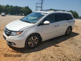 2016 Honda Odyssey Touring Elite with VIN 5FNRL5H94GB109829, listed as a Copart auction lot 52583225 with 70,740 mi miles and Salvage Title. Bid and sale history available at carsss.com. Image 1.