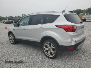 2019 Ford Escape Titanium with VIN 1FMCU9J90KUA07976, listed as a Copart auction lot 59565275 with 189,655 mi miles and Salvage title. Bid and sale history available at DreamBid. Image 2.