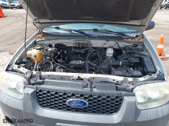 2007 Ford Escape XLS with VIN 1FMYU02Z97KB80446, listed as a IAAI auction lot 42113186 with 128,492 mi miles. Bid and sale history available at carsss.com. Image 10.