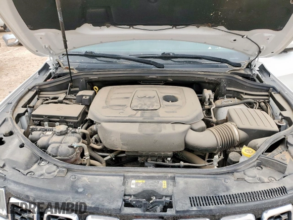 2021 Jeep Grand Cherokee Laredo X with VIN 1C4RJEAG0MC813825, listed as a Copart auction lot 59191185 with 65,888 mi miles and Salvage title. Bid and sale history available at DreamBid. Image 12.