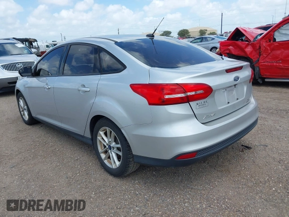 2015 Ford Focus SE with VIN 1FADP3F28FL205635, listed as a IAAI auction lot 42535860 with 135,994 mi miles and . Bid and sale history available at DreamBid. Image 3.
