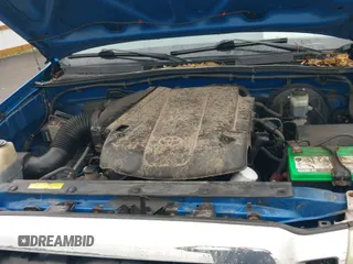 2005 Toyota Tacoma z VIN 5TEUU42N95Z055611, wystawiony jako IAAI lot #42791290 z przebiegiem 226 750 mil mil oraz . Historia ofert i sprzedaży dostępna na DreamBid. Obrazek 21.