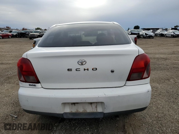 2000 Toyota ECHO with VIN JTDAT1230Y0074894, listed as a Copart auction lot 82236714 with 179,043 mi miles and Salvage Title. Bid and sale history available at DreamBid. Image 6.