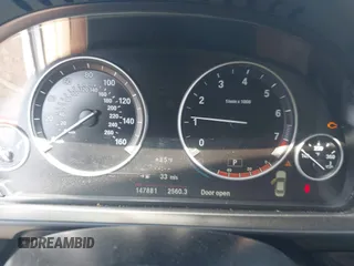 2013 BMW 5 Series 528i with VIN WBAXG5C50DD231166, listed as a IAAI auction lot 42622581 with 147,881 mi miles and . Bid and sale history available at DreamBid. Image 7.