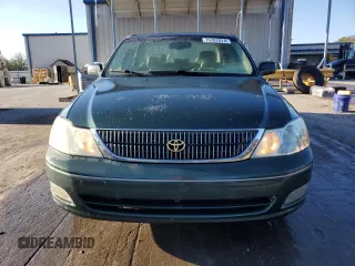 2001 Toyota Avalon XL z VIN 4T1BF28B81U162506, wystawiony jako Copart lot #52031805 z przebiegiem 212 437 mil mil oraz Szkody całkowita. Historia ofert i sprzedaży dostępna na DreamBid. Obrazek 5.