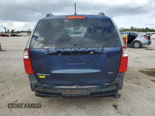 2009 Kia Sedona EX with VIN KNDMB233396299667, listed as a Copart auction lot 80186774 with 197,328 mi miles and Salvage Title. Bid and sale history available at carsss.com. Image 6.