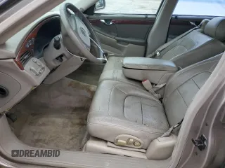 2004 Cadillac DeVille z VIN 1G6KD54Y64U134605, wystawiony jako Copart lot #56258215 z przebiegiem 256 662 mil mil oraz Szkody całkowita. Historia ofert i sprzedaży dostępna na DreamBid. Obrazek 7.