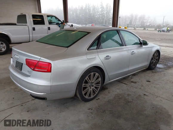 2013 Audi A8 4.0L с VIN WAUA2AFD5DN017770, выставлен на аукционе IAAI как лот 41255625 с пробегом 115 993 миль миль и . История ставок и продаж доступна на DreamBid. Изображение 4.