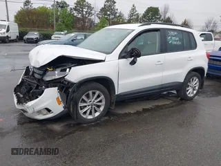 2015 Volkswagen Tiguan SE z VIN WVGBV7AX5FW584833, wystawiony jako IAAI lot #41855476 z przebiegiem 123 299 mil mil oraz . Historia ofert i sprzedaży dostępna na DreamBid. Obrazek 17.