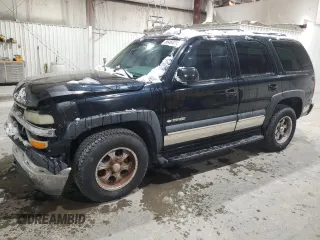 2003 Chevrolet Tahoe LS with VIN 1GNEK13Z73R216998, listed as a Copart auction lot 88460215 with 225,265 mi miles and Salvage title. Bid and sale history available at DreamBid. Image 1.