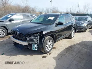 2015 Jeep Cherokee North with VIN 1C4PJMCS4FW792918, listed as a IAAI auction lot 41748651 with 107,034 mi miles. Bid and sale history available at carsss.com. Image 18.