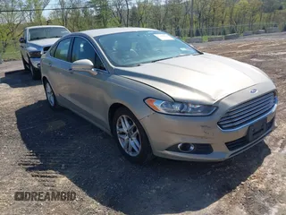 2016 Ford Fusion SE with VIN 3FA6P0HD8GR117421, listed as a IAAI auction lot 42146157 with 136,947 mi miles. Bid and sale history available at carsss.com. Image 1.