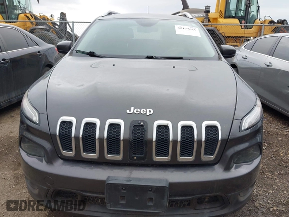 2015 Jeep Cherokee Latitude with VIN 1C4PJLCB6FW547788, listed as a IAAI auction lot 42177621 with 138,945 mi miles and . Bid and sale history available at carsss.com. Image 12.