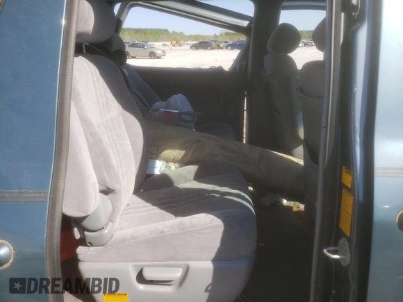 2002 Toyota Sienna LE with VIN 4T3ZF13C22U497021, listed as a Copart auction lot 52571055 with 232,973 mi miles and Salvage Title. Bid and sale history available at DreamBid. Image 11.