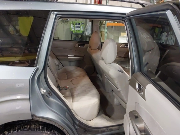 2009 Subaru Forester X with VIN JF2SH63639H762260, listed as a IAAI auction lot 41904457 with 197,913 mi miles and . Bid and sale history available at DreamBid. Image 8.