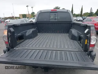2014 Toyota Tacoma PreRunner with VIN 3TMKU4HN9EM041509, listed as a IAAI auction lot 42441194 with 290,715 mi miles and . Bid and sale history available at DreamBid. Image 18.