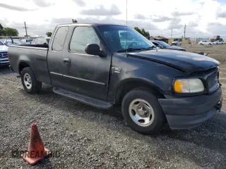 2001 Ford F-150 XL with VIN 1FTRX17W91NB71630, listed as a Copart auction lot 56583545 with 209,009 mi miles and Salvage title. Bid and sale history available at DreamBid. Image 4.