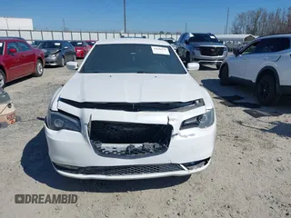 2015 Chrysler 300 with VIN 2C3CCABG9FH736013, listed as a IAAI auction lot 41646979 with 103,572 mi miles. Bid and sale history available at carsss.com. Image 12.