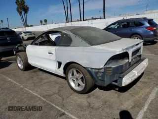 1995 Ford Mustang GT with VIN 1FALP42T7SF174211, listed as a Copart auction lot 77635124 with 158,940 mi miles and Salvage title. Bid and sale history available at DreamBid. Image 2.
