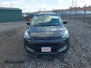 2016 Ford Escape SE with VIN 1FMCU9GX5GUA06660, listed as a IAAI auction lot 42043031 with 87,719 mi miles. Bid and sale history available at carsss.com. Image 12.
