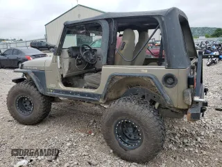 2004 Jeep Wrangler Rubicon with VIN 1J4FA69S94P774219, listed as a Copart auction lot 62806594 with 121,819 mi miles and Salvage Title. Bid and sale history available at carsss.com. Image 2.