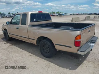 2000 Toyota Tacoma z VIN 5TEVL52N4YZ717158, wystawiony jako IAAI lot #42223643 z przebiegiem 180 515 mil mil oraz . Historia ofert i sprzedaży dostępna na DreamBid. Obrazek 3.